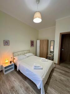 Giường trong phòng chung tại ESTIA Dionysos