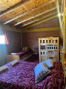 Postel nebo postele na pokoji v ubytování C La familia