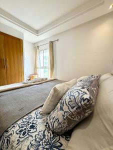 En eller flere senge i et værelse på Africa Cup 2025 - Hideaway Experience - Vue Mer