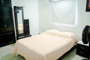 Voodi või voodid majutusasutuse Aparta Estudio Amoblado 1 a 3 Personas toas