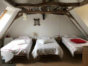 Postel nebo postele na pokoji v ubytování Chambres d'hôtes Exotique