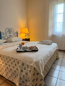 Ένα ή περισσότερα κρεβάτια σε δωμάτιο στο Poggio Loccano