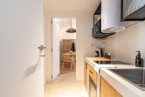 Η κουζίνα ή μικρή κουζίνα στο Meraki Home - Alle Spalle del Teatro Massimo