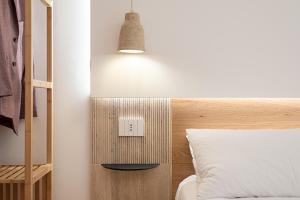 Ένα ή περισσότερα κρεβάτια σε δωμάτιο στο Meraki Home - Alle Spalle del Teatro Massimo