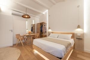 Ένα ή περισσότερα κρεβάτια σε δωμάτιο στο Meraki Home - Alle Spalle del Teatro Massimo +21 φωτογραφίες