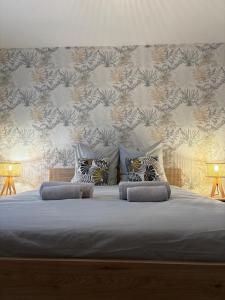 Postel nebo postele na pokoji v ubytování Le cocon + 19 fotografií