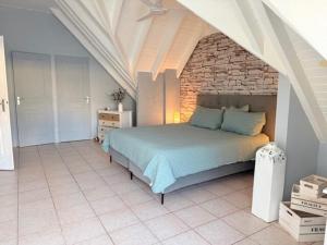 Ένα ή περισσότερα κρεβάτια σε δωμάτιο στο Mont Choisy Sea View Apartment +24 φωτογραφίες