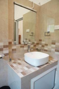 Phòng tắm tại Grand Castellea Resort