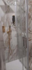 Ένα μπάνιο στο PRINCIPE ROOMS