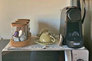 Tiện nghi pha trà/cà phê tại Estúdio Charmoso no Coração das Termas