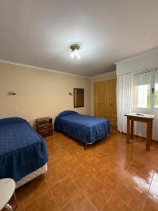 Postel nebo postele na pokoji v ubytování Cabañas kami