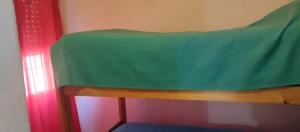 Ένα ή περισσότερα κρεβάτια σε δωμάτιο στο El bosquesito