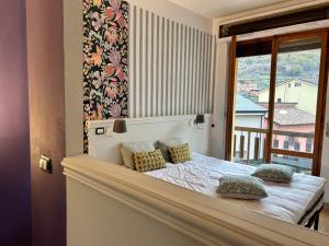 Ένα ή περισσότερα κρεβάτια σε δωμάτιο στο Don Carlo