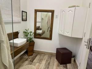 a bathroom with a sink and a mirror at Casa Matias in Socorro +19 photos