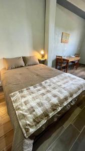 Giường trong phòng chung tại Casa Jlee +2 ảnh