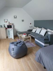 Posezení v ubytování Chambre Magnolias