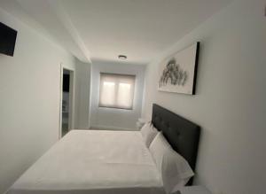 Postel nebo postele na pokoji v ubytování apartamento isabel