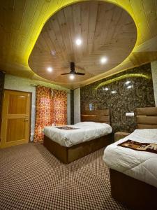 Postel nebo postele na pokoji v ubytování Nature's Resort