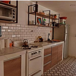 Kuchyň nebo kuchyňský kout v ubytování Casa en Cobo-Parque Lago