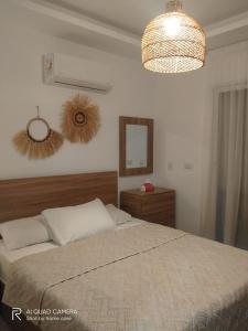 Ένα ή περισσότερα κρεβάτια σε δωμάτιο στο Chalet - Mountain view Ras EL Hekma