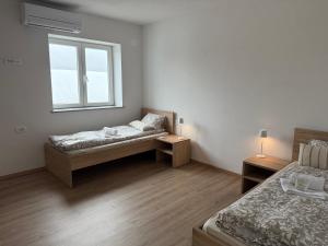 Postel nebo postele na pokoji v ubytování VP sobe