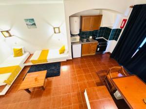 Kuchyň nebo kuchyňský kout v ubytování Studio Vila Nova