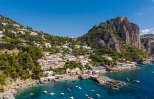 an aerial view of positano on the amalfi coast at Hotel Weber Ambassador in Capri
