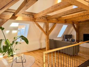 Μια τηλεόραση ή/και κέντρο ψυχαγωγίας στο Good Wood Apartment - Fachwerktraum auf zwei Etagen, direkt am Marktplatz