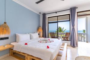 Ένα ή περισσότερα κρεβάτια σε δωμάτιο στο Marea Boutique Hotel +72 φωτογραφίες