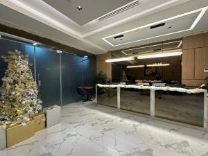 Лобби или стойка регистрации в Murji Suites in 34th Floor at JTower Residences