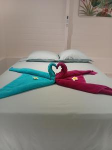 Ένα ή περισσότερα κρεβάτια σε δωμάτιο στο Logement cosy et chic