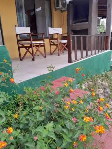 Zahrada ubytování cabanas La Bahia Escondida + 2 fotografie