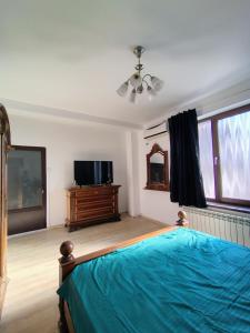 TV a/nebo společenská místnost v ubytování CASA Don Lucio