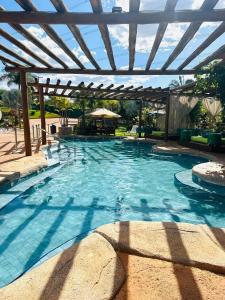 Bazén v ubytování Red Apartament Praia da Oura nebo v jeho okolí