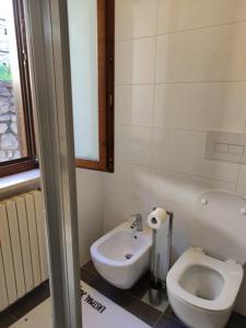 Koupelna v ubytování Appartamento Panoramico by Theater Home