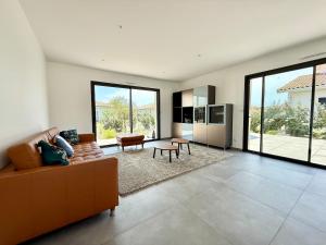 Et opholdsområde på Villa Aurora Piscine 7 personnes