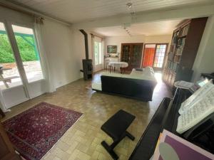 Postel nebo postele na pokoji v ubytování Chambres d'Hôtes du Prieur