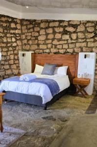 Postel nebo postele na pokoji v ubytování Safari Park Guest Farm + 45 fotografií