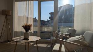 Et opholdsområde på HarmoNest Rheydt Apartments