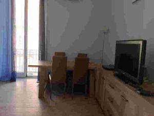 TV a/nebo společenská místnost v ubytování casa adriana