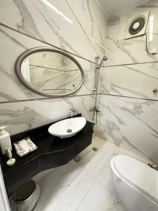 Phòng tắm tại Lovely High Quality Self Check-in Apartments شقق سلام بالدخول الذاتي +46 ảnh