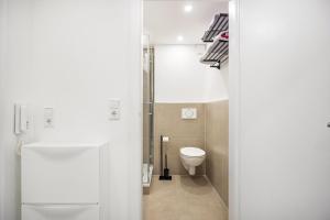 Ένα μπάνιο στο Apartment in Sarstedt +12 φωτογραφίες