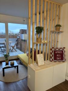 Posezení v ubytování Beautiful Studio - Geneva Airport + 17 fotografií