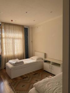 Postel nebo postele na pokoji v ubytování Manija Hostel