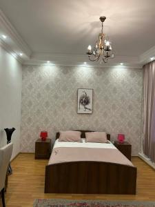 Una cama o camas en una habitación de Apartment 9 22 fotos más