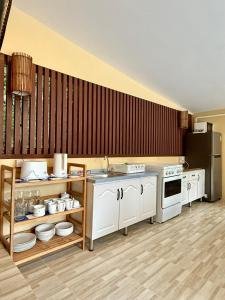 Kuchyň nebo kuchyňský kout v ubytování The glade