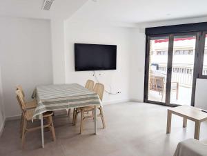 TV a/nebo společenská místnost v ubytování Modern apartment 2 minutes from Benicàssim beach