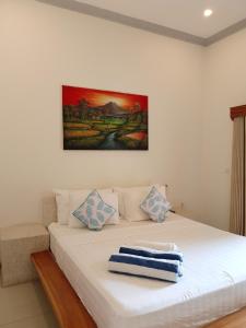 En eller flere senge i et værelse på Villa Faris + 16 billeder