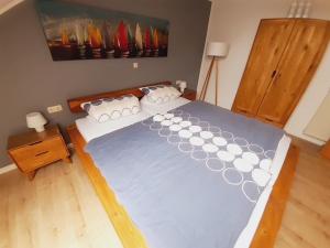 Ένα ή περισσότερα κρεβάτια σε δωμάτιο στο Hafenblick