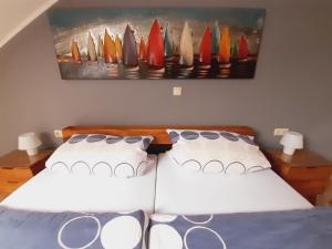 Ένα ή περισσότερα κρεβάτια σε δωμάτιο στο Hafenblick